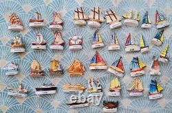 Lot (1 sur 2) de fèves anciennes bateaux, phare, Disney, etc Mat, Brillant